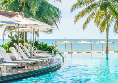 Umbrella with chair in hotel  swimming pool resort